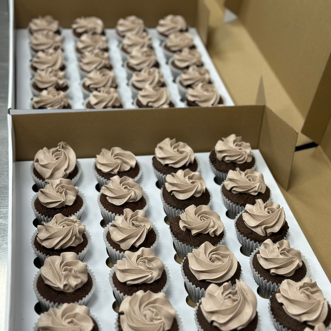Custom logo cupcakes with edible business branding, ideal for corporate events