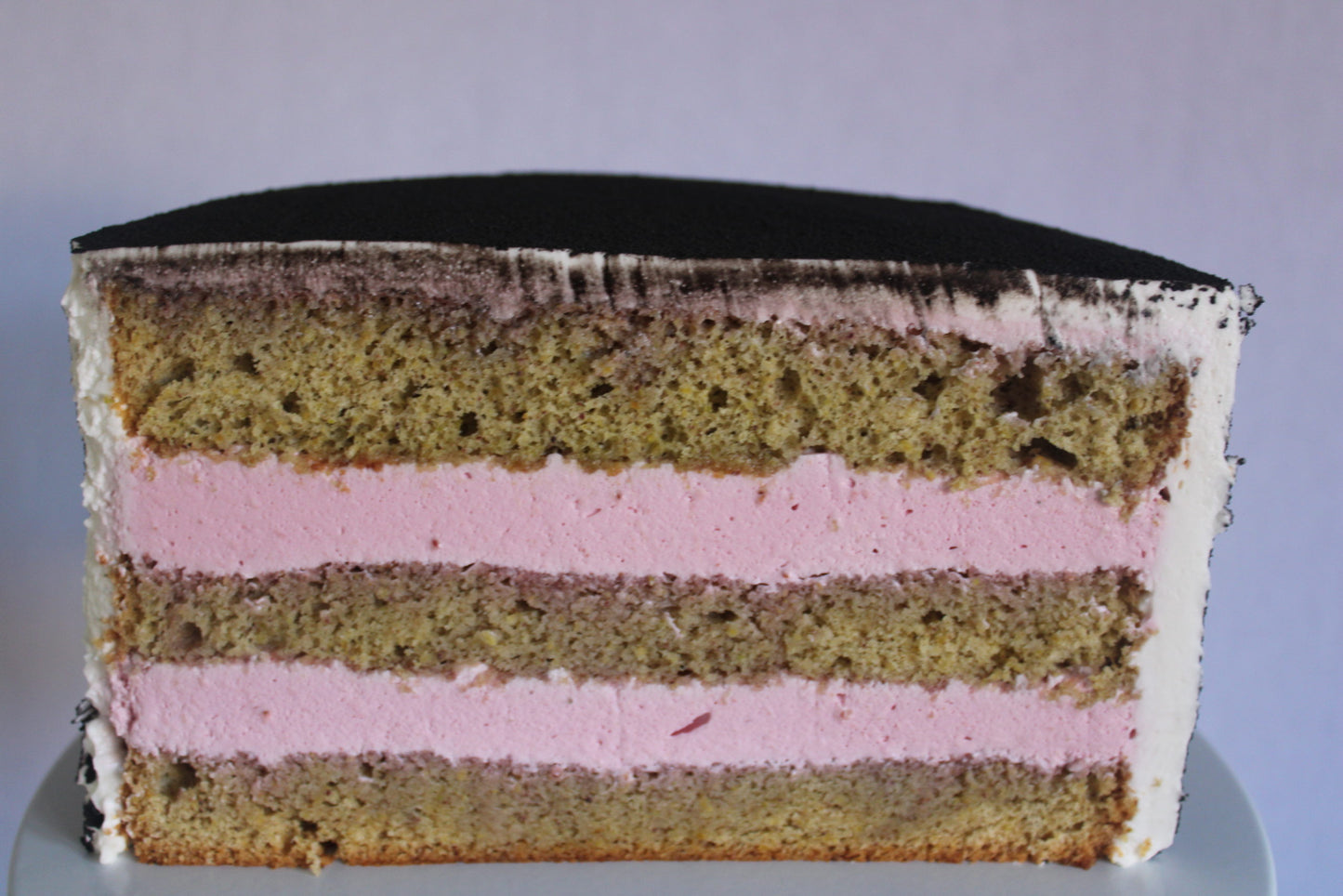 Pistachio Velvet Cake with a black velvet effect for special occasions