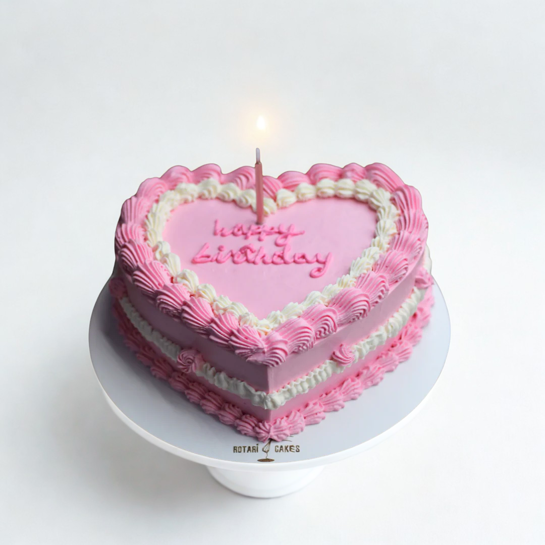 Heart shaped cake in pink colour