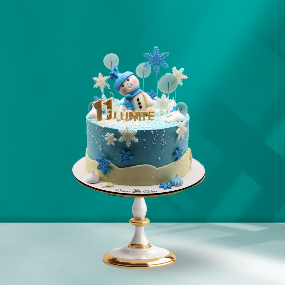 Snow Man Cake for kids with snow design on it