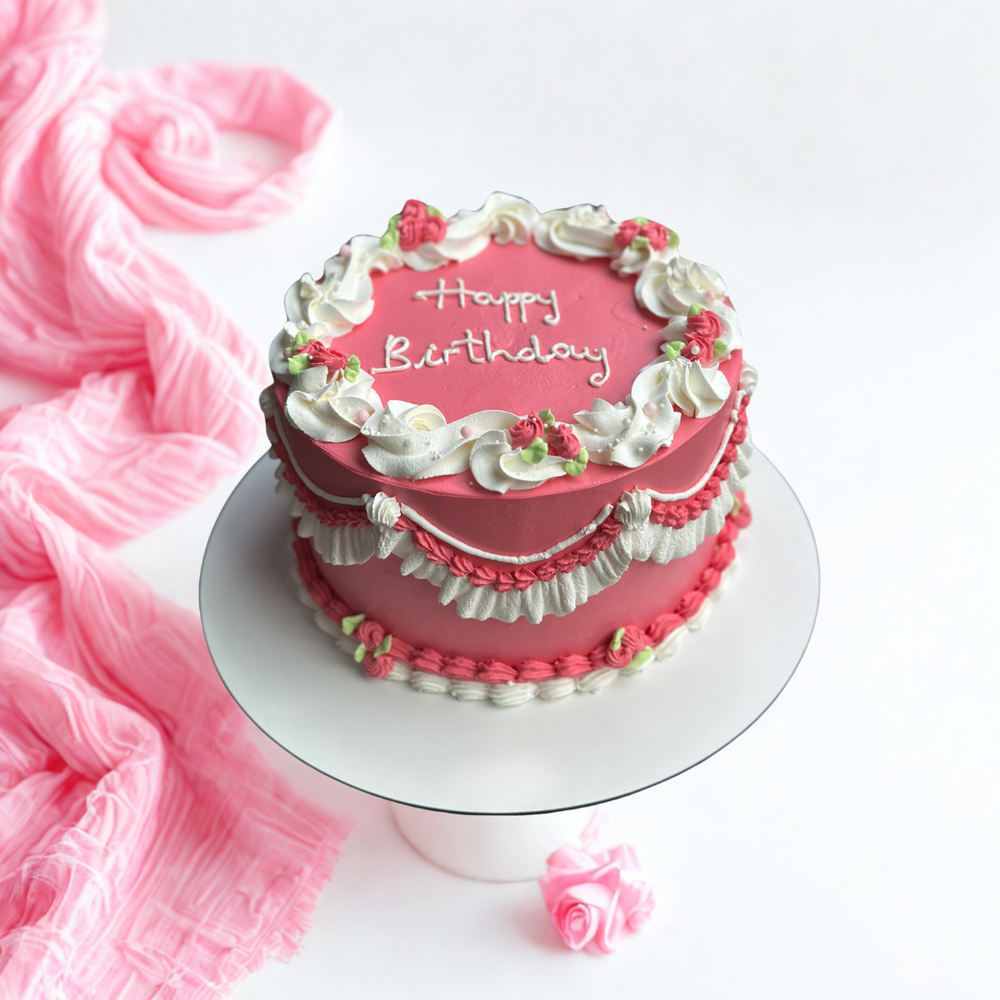 Flowers Piping Cake in pink colour ideal for birthdays and other celebrations