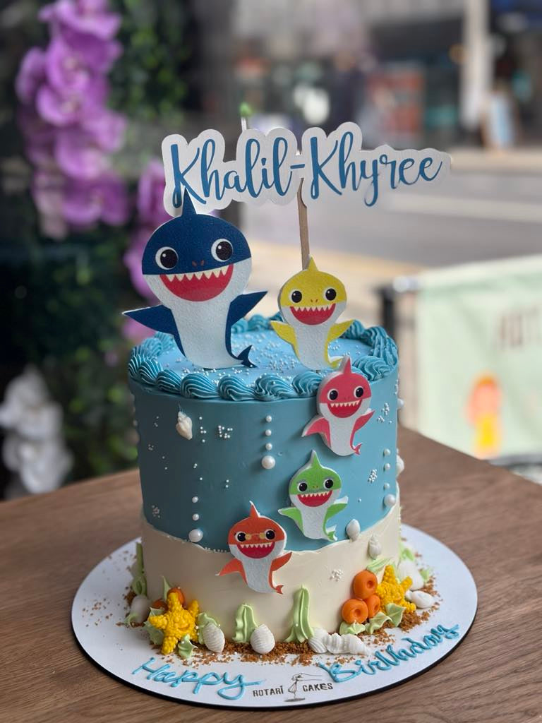 Baby shark theme cake in blue colour for kids birthdays