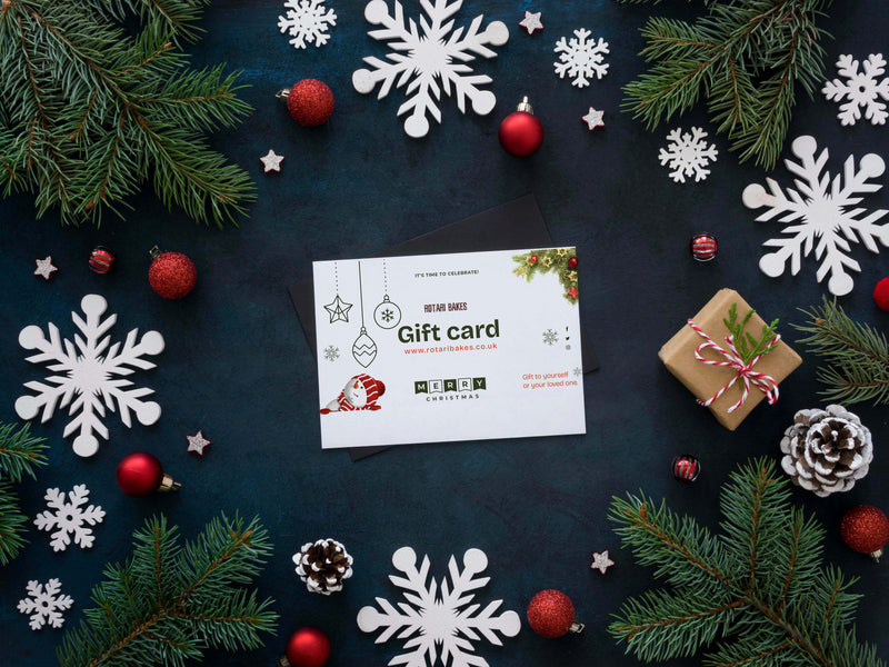 Gift card on a festive background with Christmas decorations