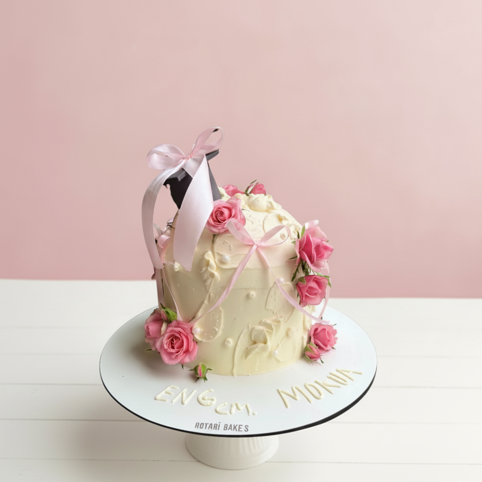 dome shape graduation cake with pink flowers and ribbons for home delivery and collection in Nottingham