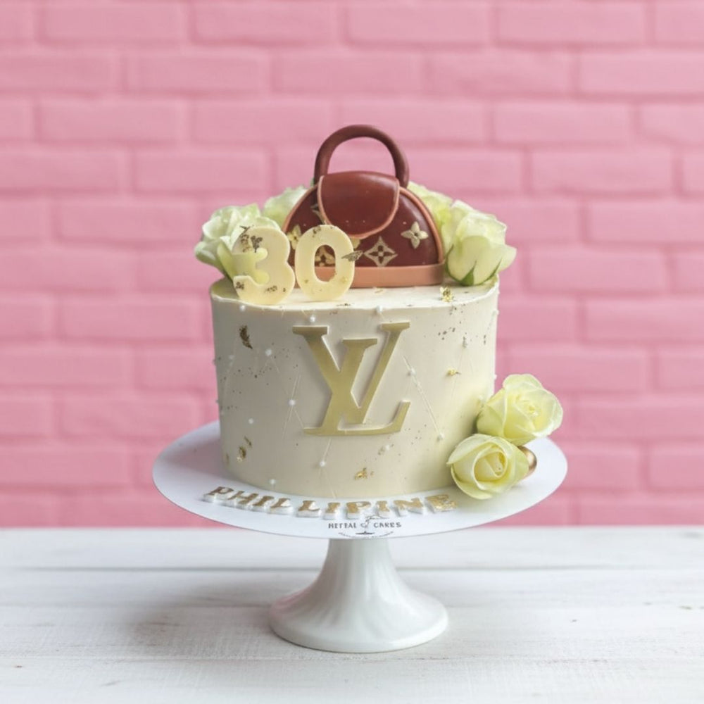 LV Theme Decorative cake with a handbag and flowers on a pink background