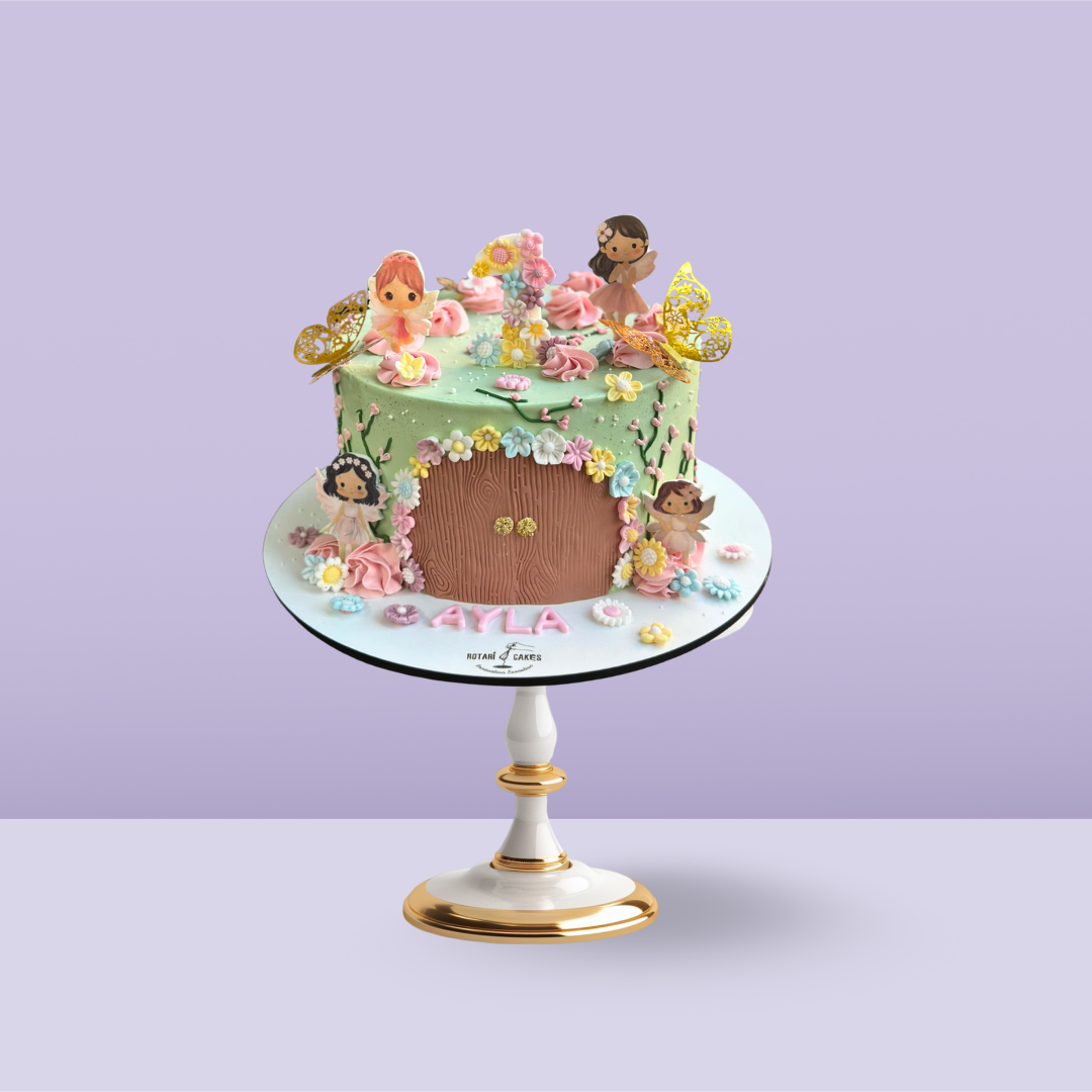 Fairy Cake  with pastel colours, fairy topper, for birthdays and fairy-themed parties.