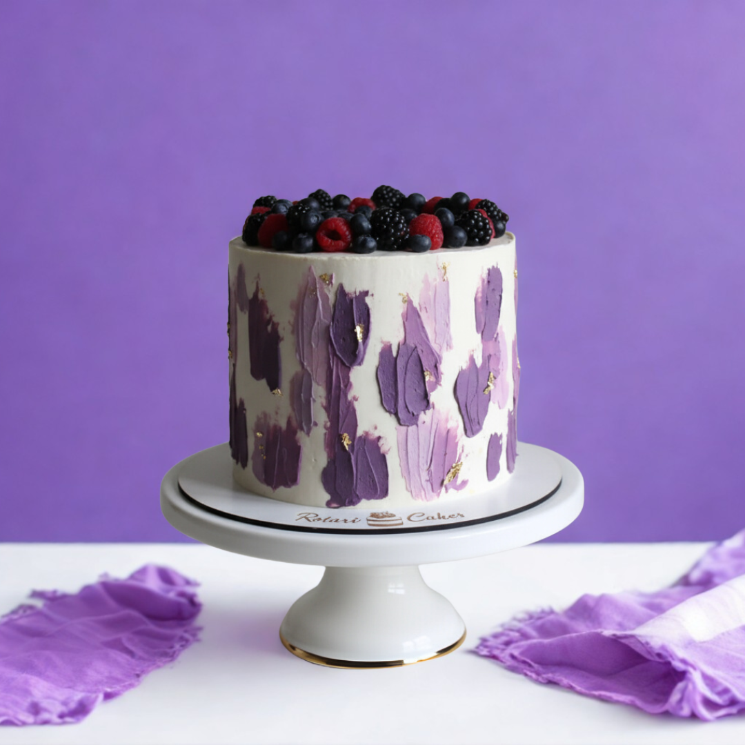 berries Cake with purple abstract design and berries on a white stand against a purple background