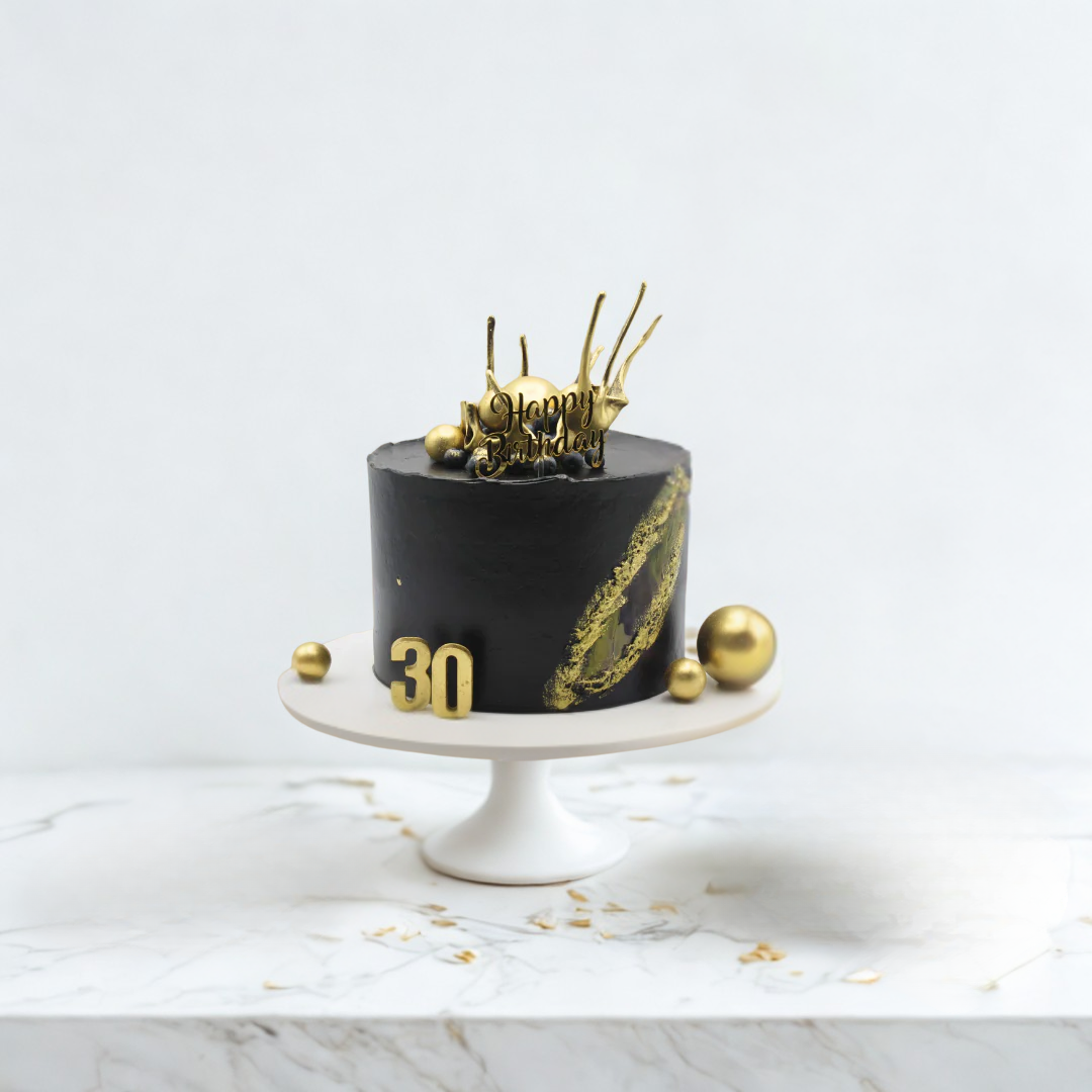 black beer cake with 30th birthday topper