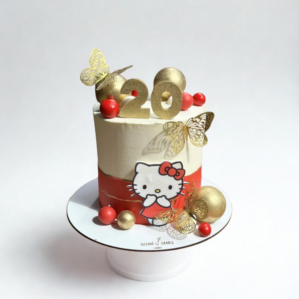 kitty theme cake with golden touch and butterfly