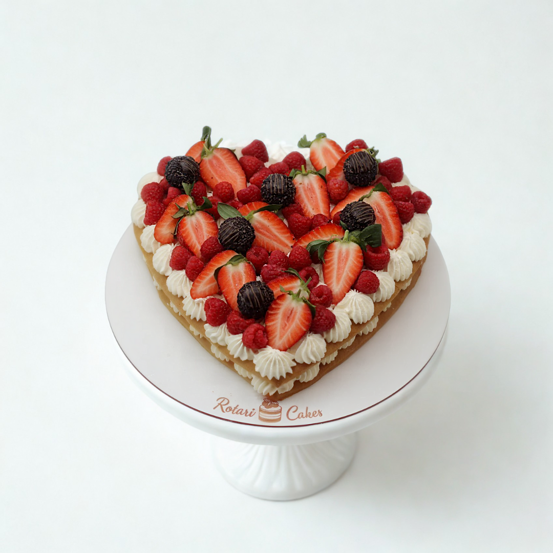 Heart-shaped cake with berries 