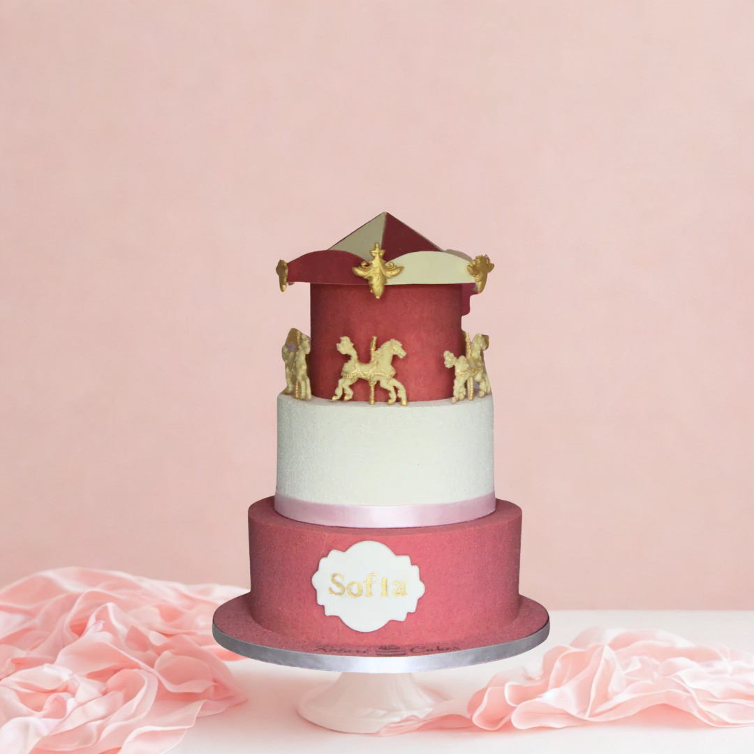 three-tiered horses cake with red and white design, gold accents