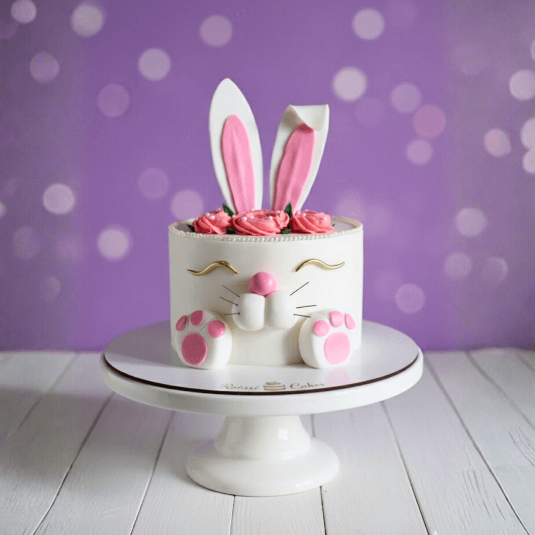 bunny rabbit theme cake in white and pink colour for kids