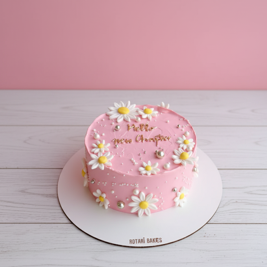 Pink cake with white flowers on a white surface and pink background