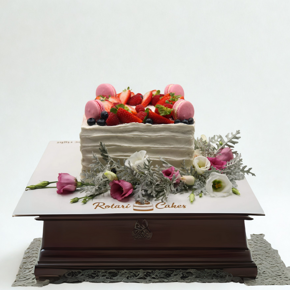 poppy cake with fruits and flowers