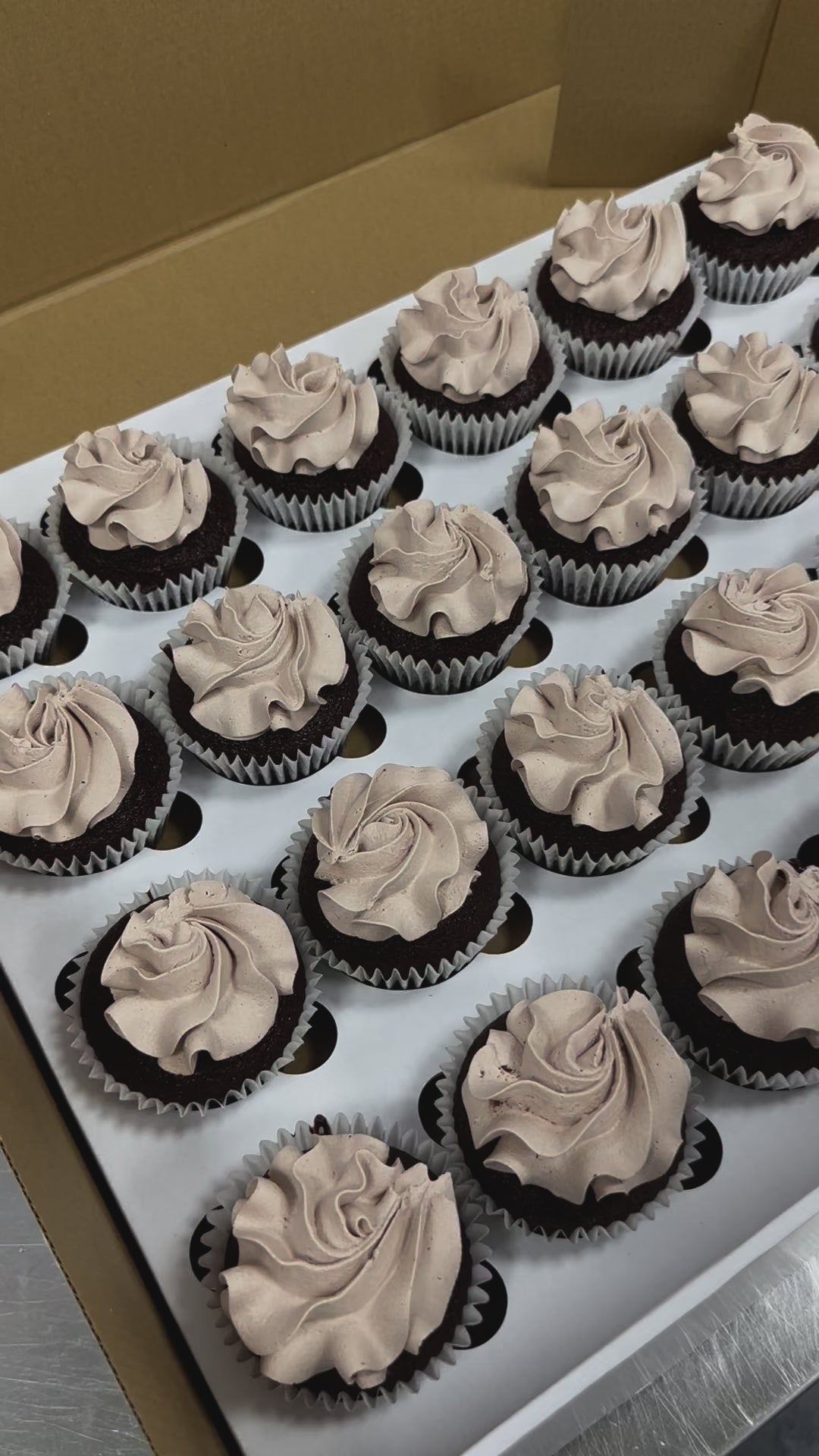 Custom logo cupcakes with edible business branding, ideal for corporate events