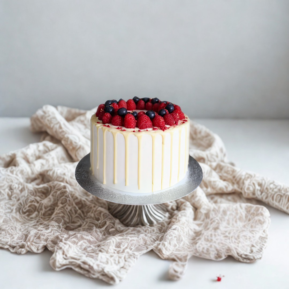 red velvet cake with berries on top for birthdays and other occasion