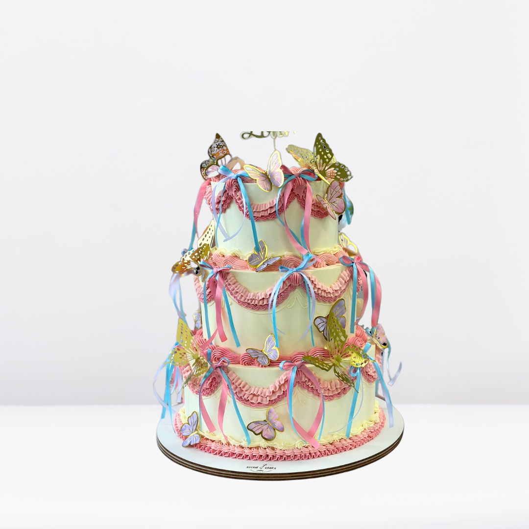 Rustic-style cake featuring natural textures and butterfly decorations for elegant celebrations