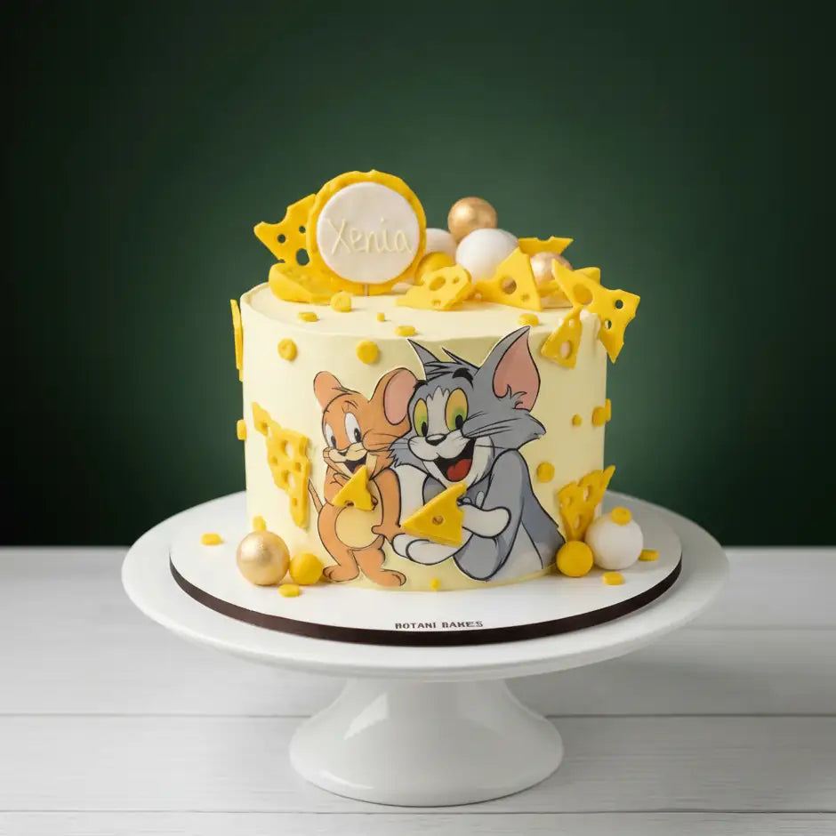 tom and jerry cake with cartoon characters on a white stand against a dark green background