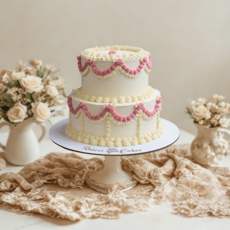 Two-tiered vintage piping cake for weddings and birthdays