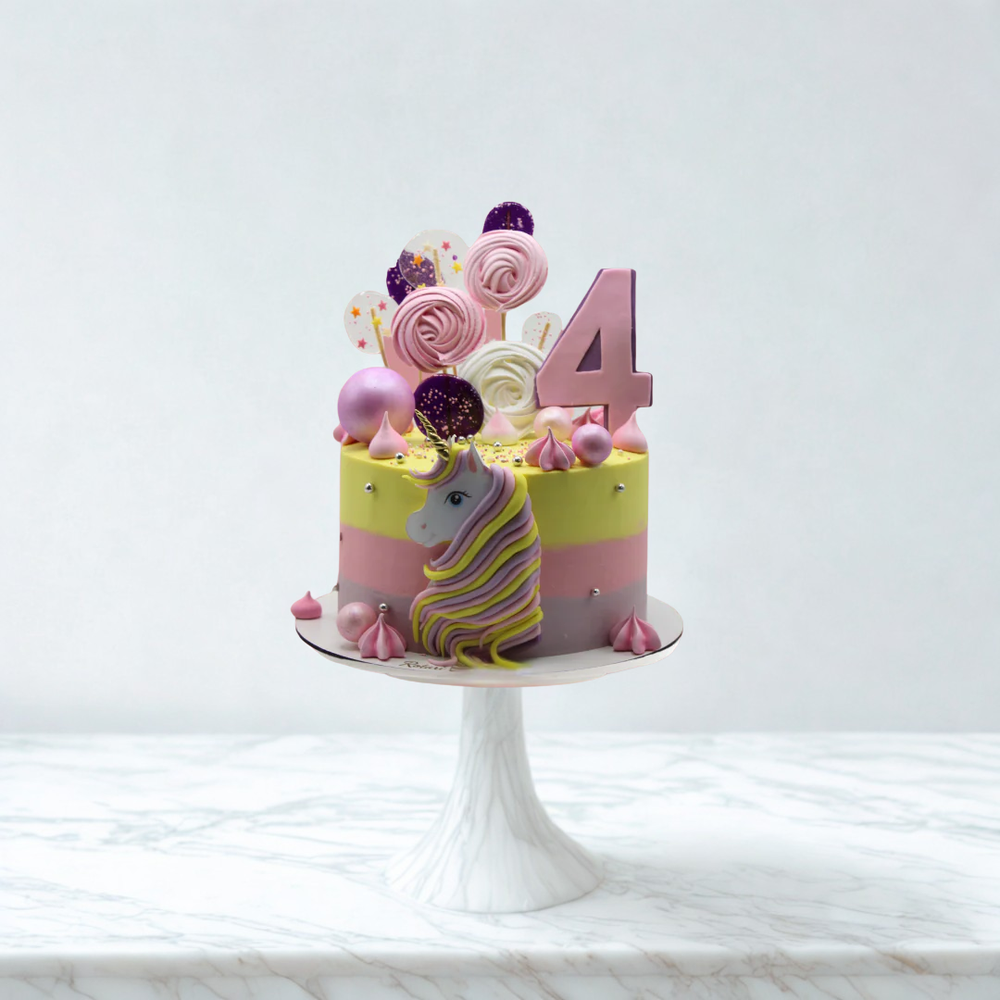 
                  
                    Decorative birthday cake with number '4' and unicorn figurine on a white background
                  
                