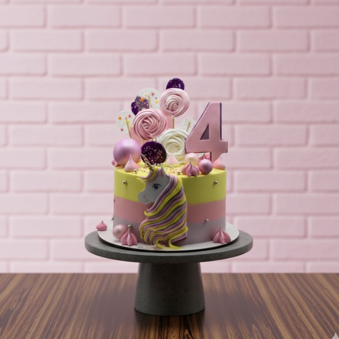 Colorful birthday cake with unicorn design and number '4' on a pink brick wall background