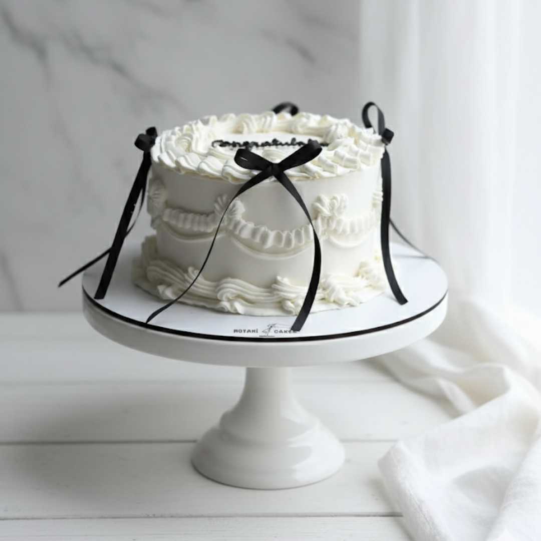 vintage piping cake white colour wit ribbons