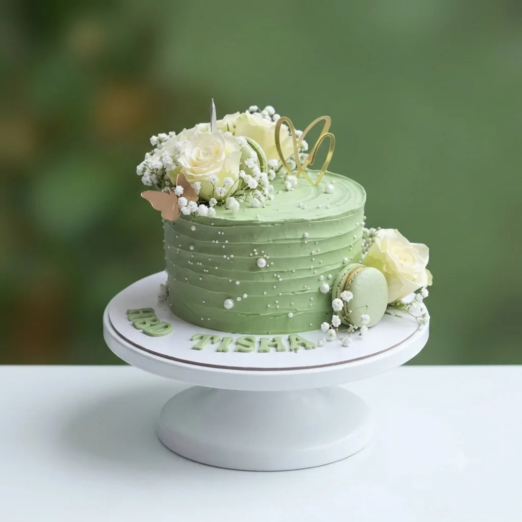 green colour cake with white flowers on top